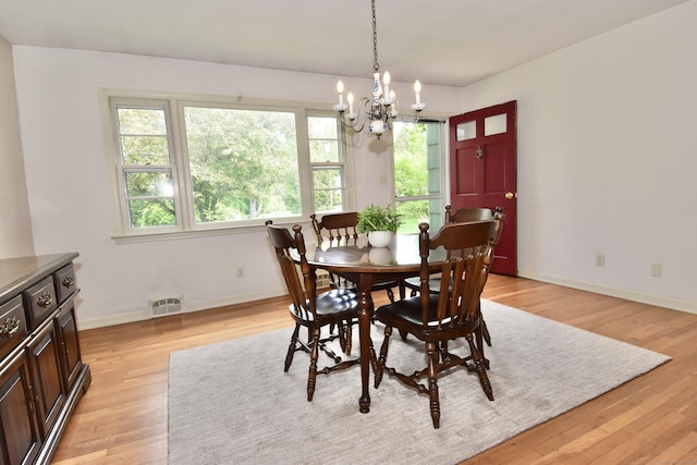 12 Cedar Ln, Oxford, CT 06478 - dining space with a chandelier, light wood finished floors, and baseboards