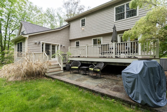 79 Erdoni Rd, Columbia, CT 06237 - rear view of house featuring a patio, a wooden deck, and a shingled roof