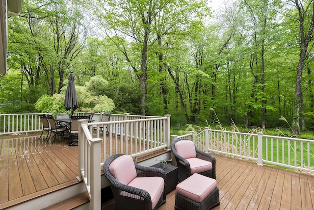 79 Erdoni Rd, Columbia, CT 06237 - wooden terrace with outdoor dining space and a view of trees