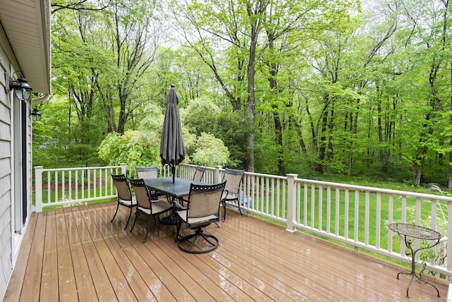 79 Erdoni Rd, Columbia, CT 06237 - wooden terrace with outdoor dining space and a lawn