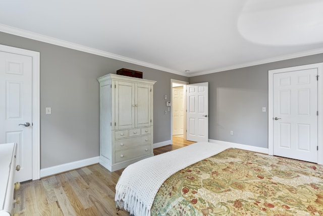 79 Erdoni Rd, Columbia, CT 06237 - bedroom with light wood-style flooring, baseboards, and ornamental molding