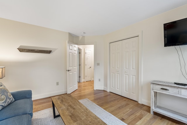 79 Erdoni Rd, Columbia, CT 06237 - living room featuring light wood-type flooring and baseboards