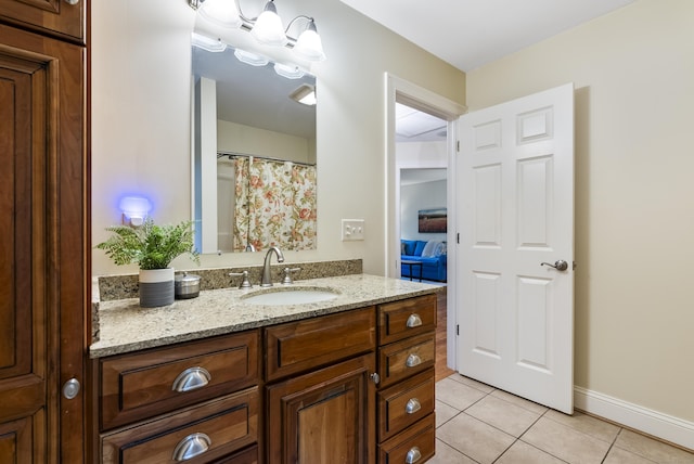 79 Erdoni Rd, Columbia, CT 06237 - bathroom featuring tile patterned flooring, vanity, and baseboards