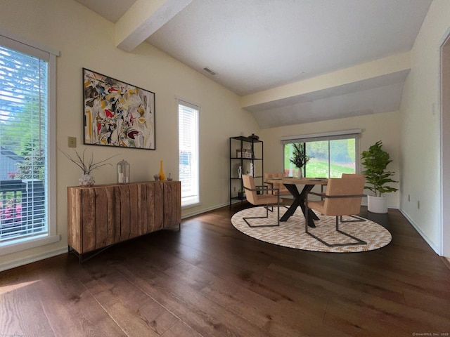 living area featuring hardwood / wood-style floors and baseboards