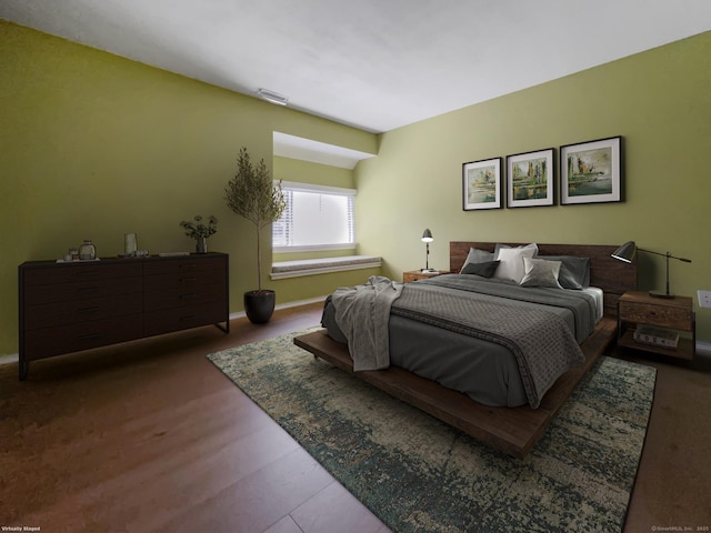 bedroom featuring baseboards