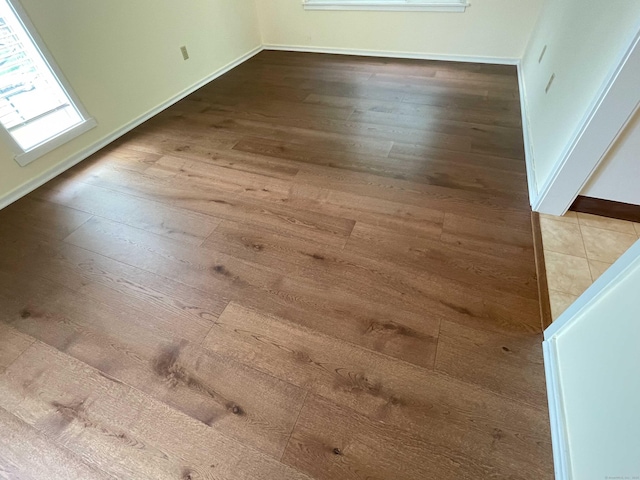 detailed view of wood finished floors and baseboards
