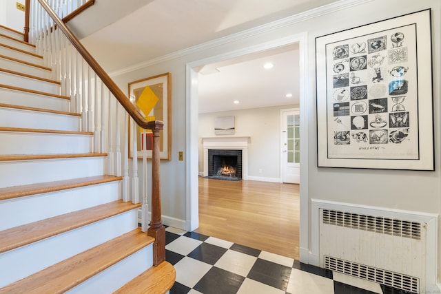 46 Glenbrook Rd, West Hartford, CT 06107 - stairway with radiator heating unit, tile patterned floors, recessed lighting, ornamental molding, and baseboards