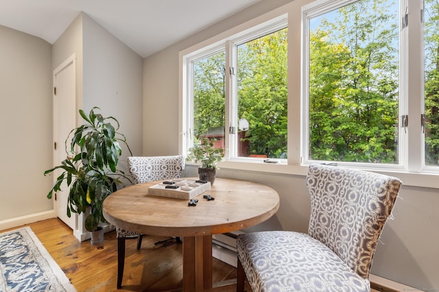 46 Glenbrook Rd, West Hartford, CT 06107 - dining space featuring light wood-style floors, baseboards, and vaulted ceiling