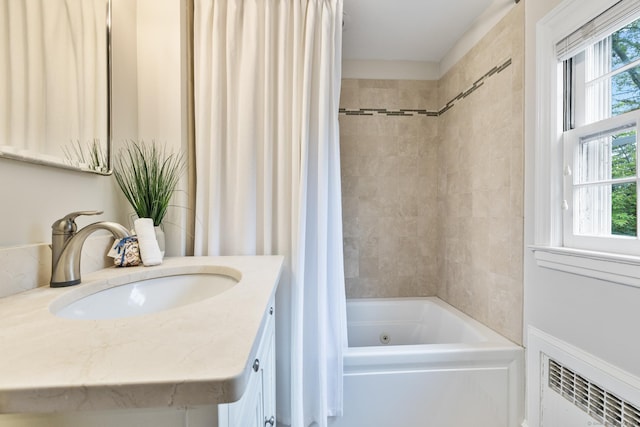 46 Glenbrook Rd, West Hartford, CT 06107 - bathroom with radiator heating unit, shower / bath combo, and vanity