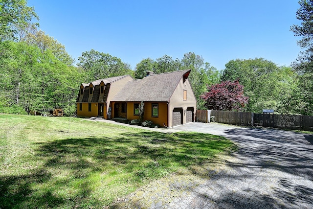 7 Stonegate Rd, East Hampton, CT 06424 - view of side of property featuring concrete driveway, a chimney, and a shingled roof