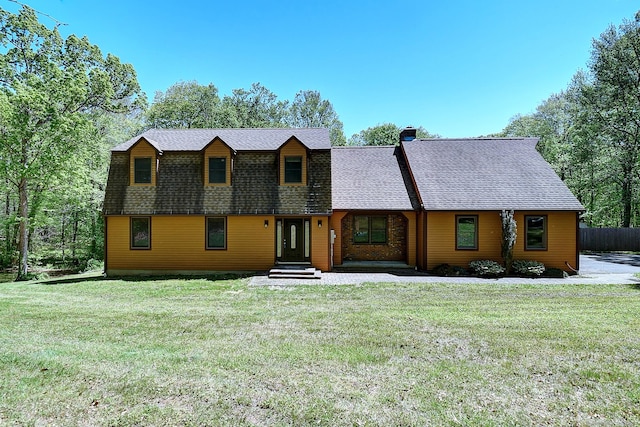 7 Stonegate Rd, East Hampton, CT 06424 - view of front of home with a shingled roof and a chimney