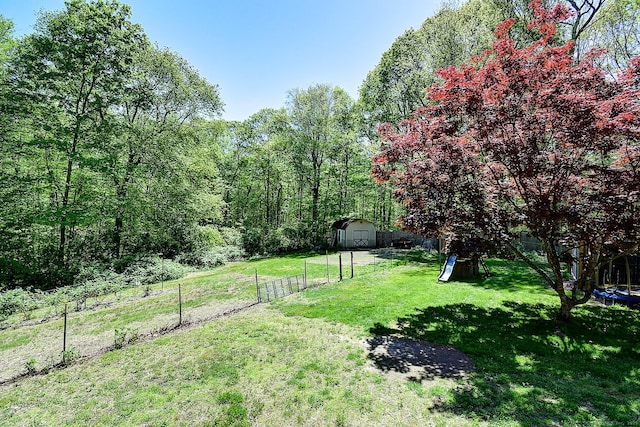 7 Stonegate Rd, East Hampton, CT 06424 - view of yard featuring a storage shed and an outbuilding