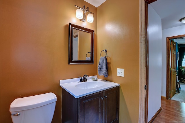 7 Stonegate Rd, East Hampton, CT 06424 - bathroom featuring toilet, vanity, and wood finished floors