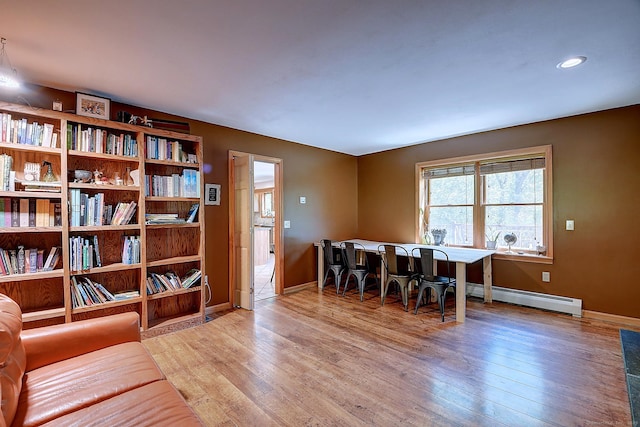 7 Stonegate Rd, East Hampton, CT 06424 - dining space with a baseboard radiator, wood finished floors, baseboards, and recessed lighting