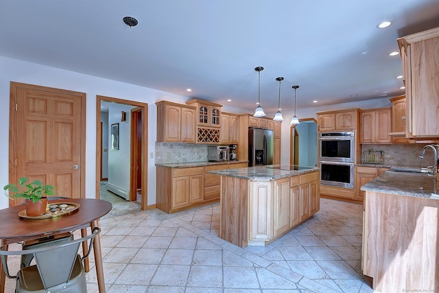 7 Stonegate Rd, East Hampton, CT 06424 - kitchen featuring stainless steel appliances, a sink, decorative backsplash, recessed lighting, and light stone countertops