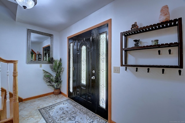 7 Stonegate Rd, East Hampton, CT 06424 - foyer entrance with stairway and baseboards