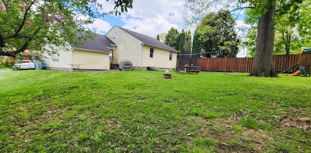 view of yard with a trampoline