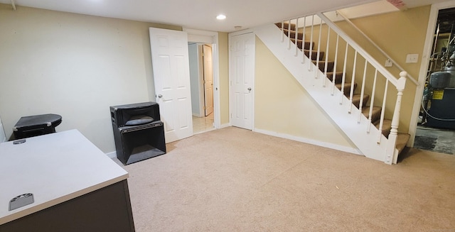 unfurnished office featuring recessed lighting, carpet, and baseboards