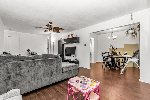 173 Kennedy Dr Unit 173, Bridgeport, CT 06606 - living area with wood finished floors, a ceiling fan, a chandelier, and baseboards