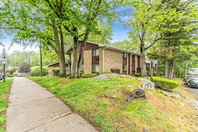173 Kennedy Dr Unit 173, Bridgeport, CT 06606 - view of side of property with brick siding
