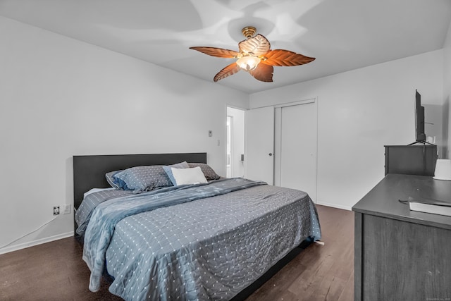 173 Kennedy Dr Unit 173, Bridgeport, CT 06606 - bedroom with a closet, a ceiling fan, baseboards, and dark wood-style flooring