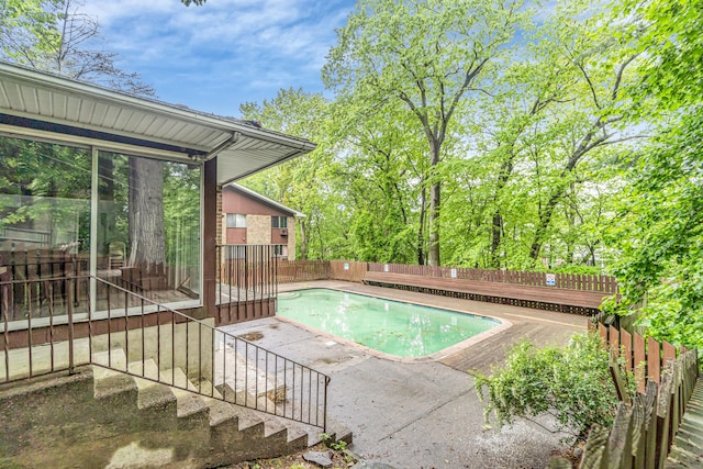 173 Kennedy Dr Unit 173, Bridgeport, CT 06606 - view of swimming pool with a fenced backyard, a patio area, and a deck