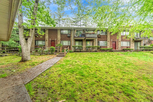 173 Kennedy Dr Unit 173, Bridgeport, CT 06606 - back of property featuring brick siding and a balcony