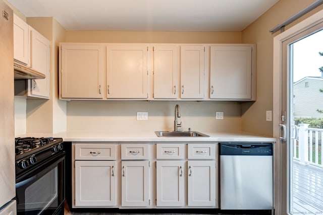 kitchen with dishwasher, a sink, black gas stove, light countertops, and under cabinet range hood