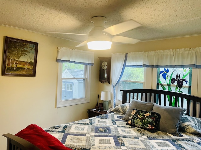 91 Shawnee Rd, East Hartford, CT 06118 - bedroom with a textured ceiling and crown molding