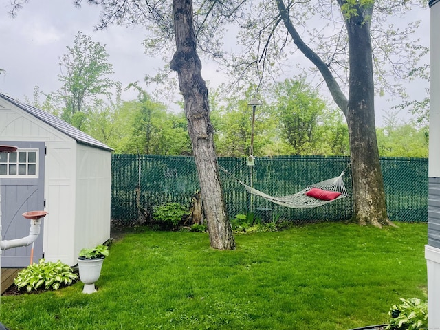 91 Shawnee Rd, East Hartford, CT 06118 - view of yard with an outdoor structure and a storage shed