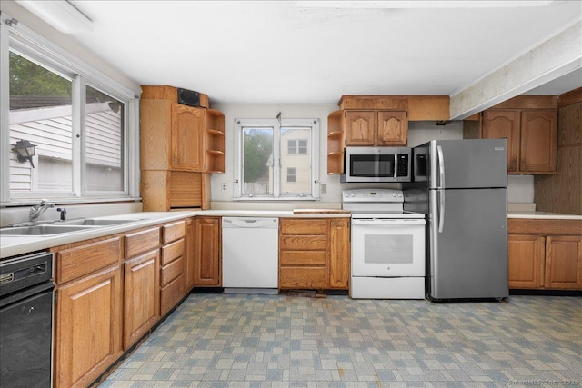 20 Cedar Ln, Norwich, CT 06360 - kitchen with appliances with stainless steel finishes, open shelves, a sink, and healthy amount of natural light
