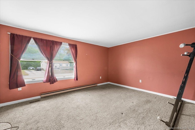 20 Cedar Ln, Norwich, CT 06360 - spare room featuring a baseboard heating unit, carpet flooring, and baseboards