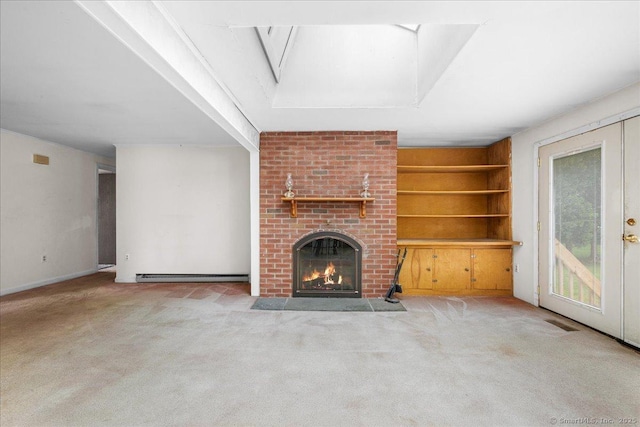 20 Cedar Ln, Norwich, CT 06360 - unfurnished living room with a baseboard radiator, a fireplace, and carpet flooring