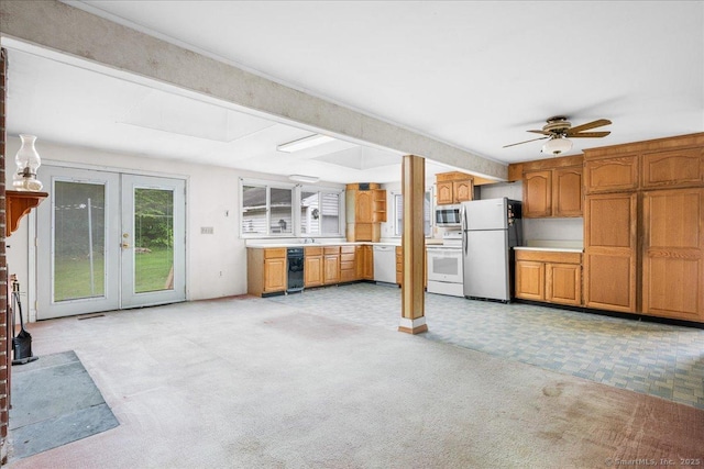 20 Cedar Ln, Norwich, CT 06360 - unfurnished living room featuring french doors, light carpet, and ceiling fan