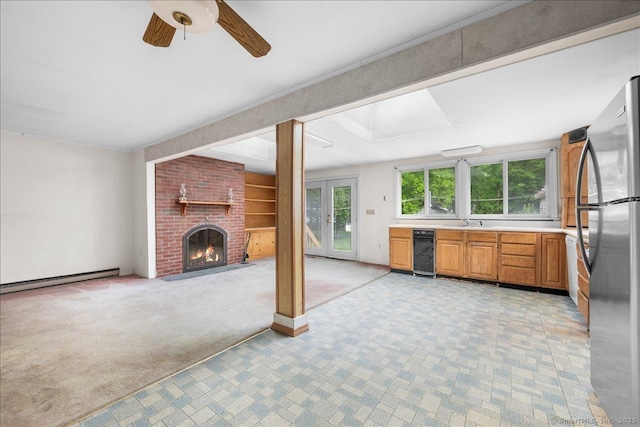 20 Cedar Ln, Norwich, CT 06360 - kitchen featuring baseboard heating, light carpet, freestanding refrigerator, light countertops, and a ceiling fan