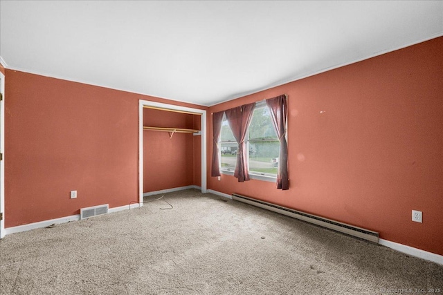 20 Cedar Ln, Norwich, CT 06360 - unfurnished bedroom featuring a baseboard radiator, a closet, carpet floors, and baseboards