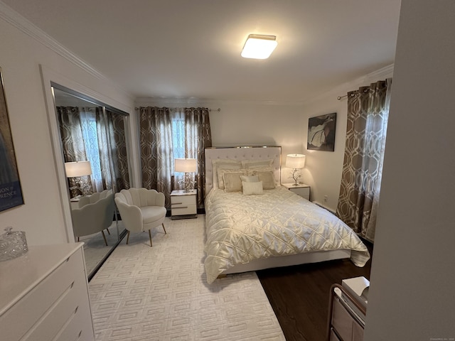 bedroom with crown molding