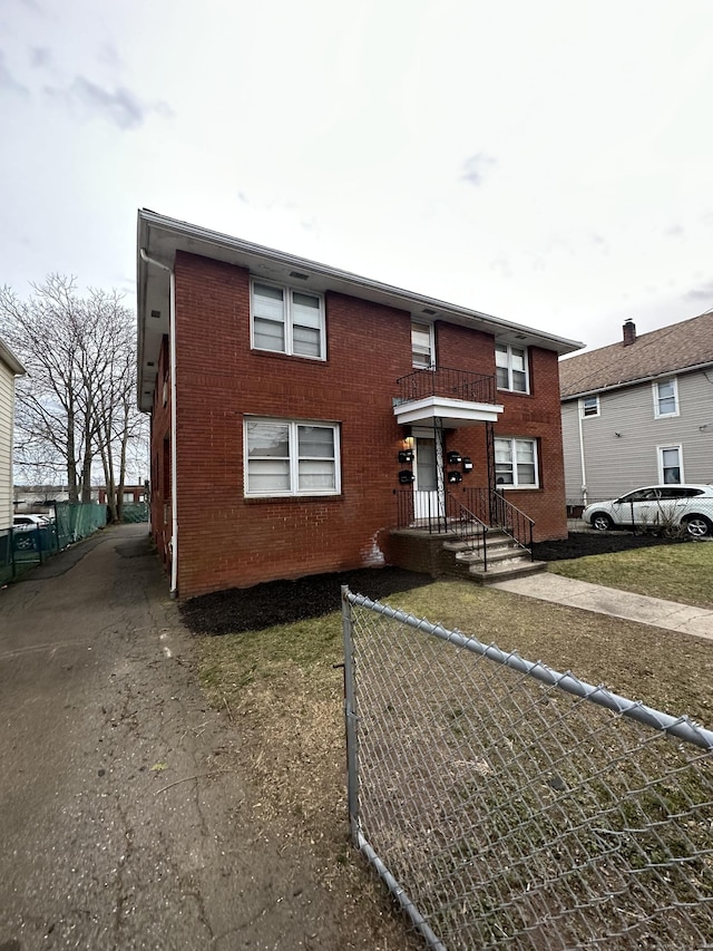 74 Saltonstall Ave, New Haven, CT 06513 - townhome / multi-family property featuring fence and brick siding