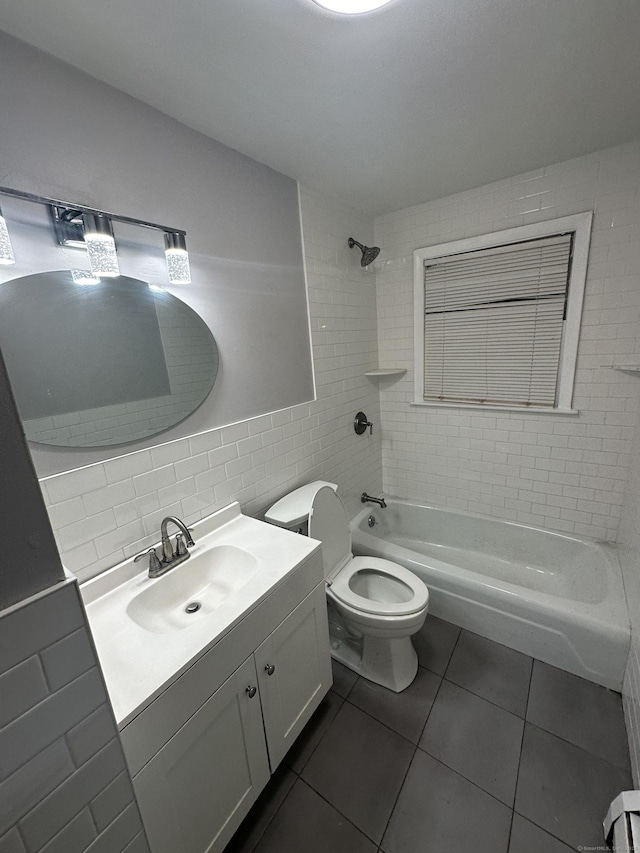 74 Saltonstall Ave, New Haven, CT 06513 - bathroom with tile walls, tile patterned floors, toilet, shower / bath combination, and vanity