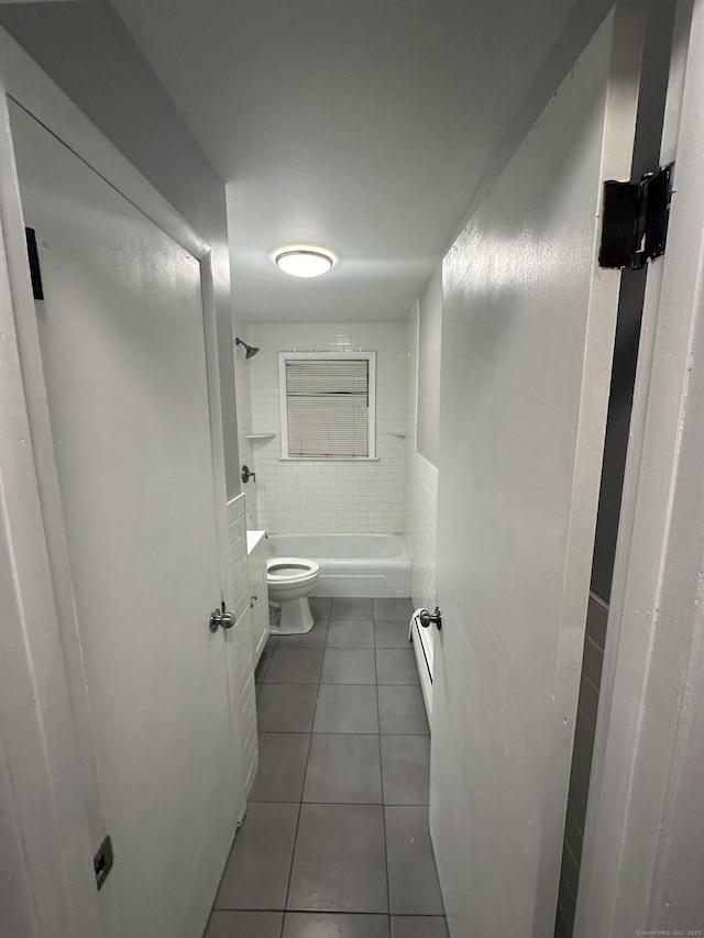 74 Saltonstall Ave, New Haven, CT 06513 - bathroom featuring tile patterned flooring, toilet, a baseboard radiator, and tub / shower combination