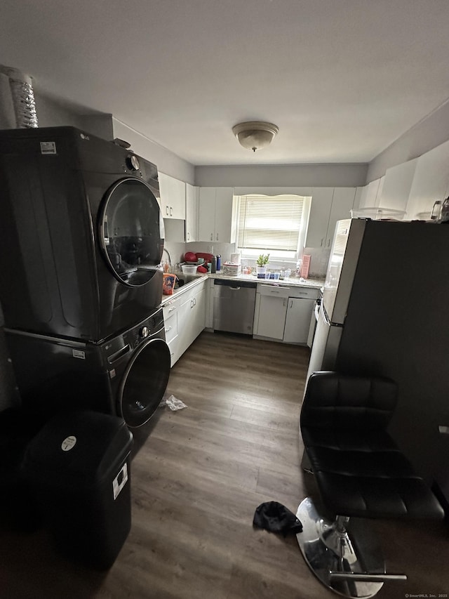 74 Saltonstall Ave, New Haven, CT 06513 - clothes washing area with stacked washing machine and dryer and dark wood-type flooring