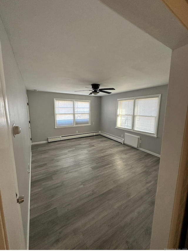 74 Saltonstall Ave, New Haven, CT 06513 - unfurnished room with baseboards, dark wood-style floors, ceiling fan, and baseboard heating