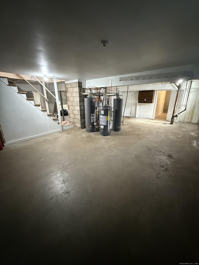 74 Saltonstall Ave, New Haven, CT 06513 - unfinished basement featuring gas water heater and stairs