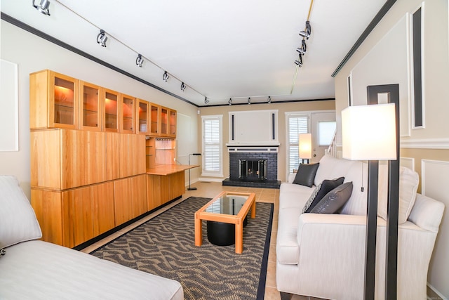 85 Viscount Dr Unit 10A, Milford, CT 06460 - living room with track lighting, tile patterned floors, and a fireplace