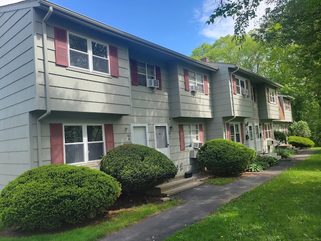 multi unit property featuring a chimney