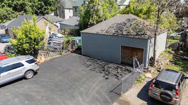 detached garage with a residential view