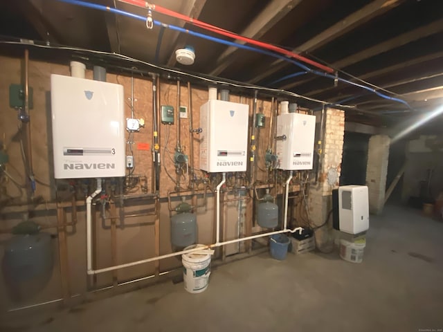 utility room with water heater and tankless water heater