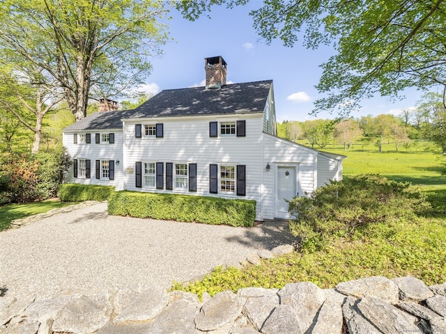 61 Nod Hill Rd, Wilton, CT 06897 - rear view of property featuring a chimney