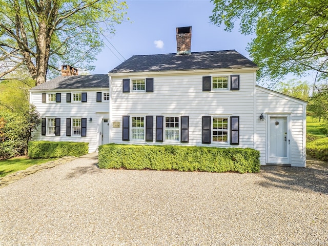 61 Nod Hill Rd, Wilton, CT 06897 - colonial inspired home featuring a chimney