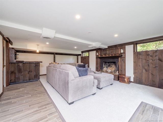 61 Nod Hill Rd, Wilton, CT 06897 - living area featuring a fireplace, light wood-style flooring, bar, and recessed lighting